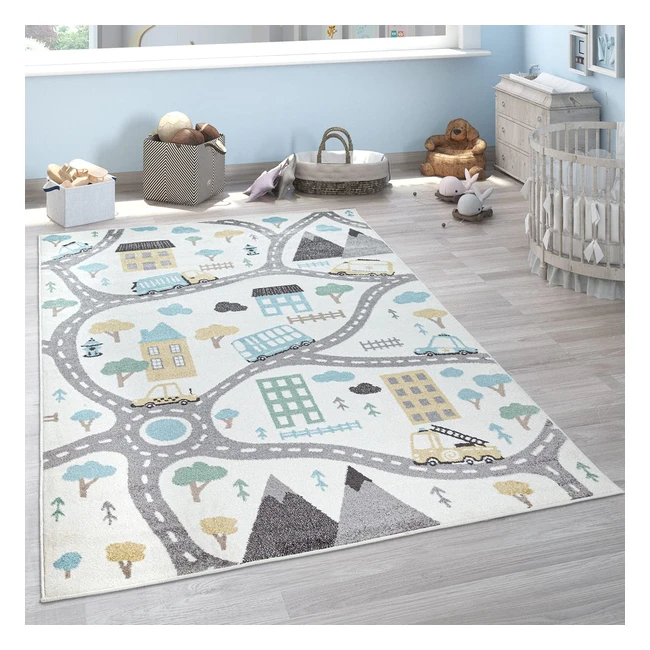 Paco Home Kinderteppich 133x190cm | Auto, Straße, Haus | Pastellfarben für Jungen und Mädchen | Creme, Petrol, Grau, Gelb