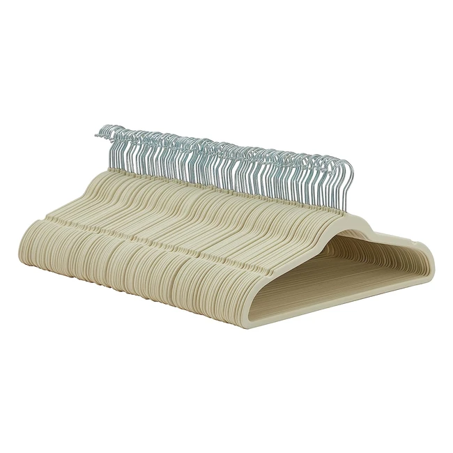 Perchas de terciopelo para trajes Amazon Basics - Paquete de 100 (Marfil)